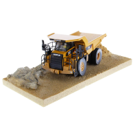 85756 Масштабная модель самосвала Cat 770 Weathered с атмосферными воздействиями "в работе"  в масштабе 1:50