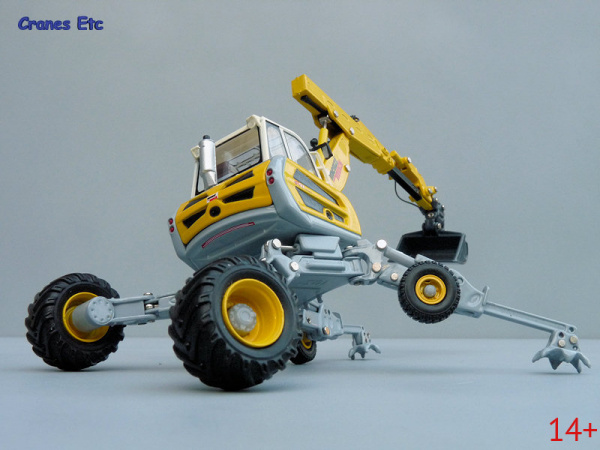 00180.0 Масштабная модель Menzi Muck A91 Mobil экскаватор-паук в масштабе 1:50