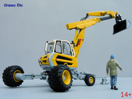 00180.0 Масштабная модель Menzi Muck A91 Mobil экскаватор-паук в масштабе 1:50