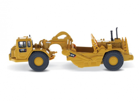 85134 Масштабная модель Колесный трактор-скрепер Cat® 627G в масштабе 1:87