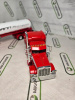 69-1794 Масштабная модель Peterbilt® 389 с прицепом-цистерной Mississippi® LP сувенирная продукция в масштабе 1 64