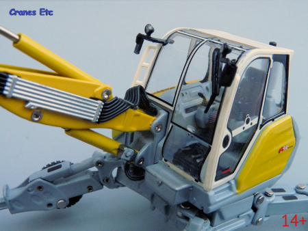 00180.0 Масштабная модель Menzi Muck A91 Mobil экскаватор-паук в масштабе 1:50