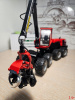 10-4239 Масштабная модель лесозаготовительной машины комбайна Komatsu 931XC.3 харвестер в масштабе 1:32